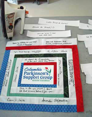 Showing how we combined the entries together to create our group's panel for the 2010 PDF Quilt Project.
