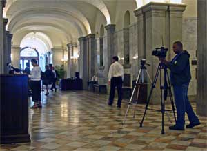 WIS photographer setting up for video taping