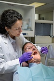 Photo of dentist with man
